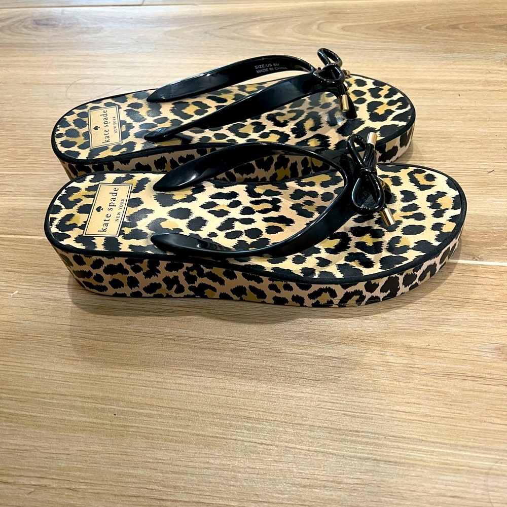 COPY - Kate Spade wedge sandal with Cheetah print and bow detail on strap.